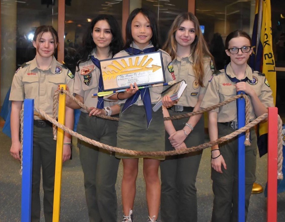 Emily Pak also earned the Arrow of Light and crossed over to Scout troop 9297.
